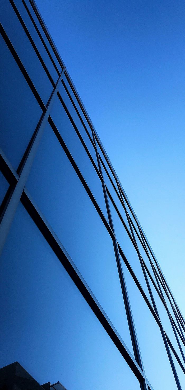 Modern office building representing enterprise security posture