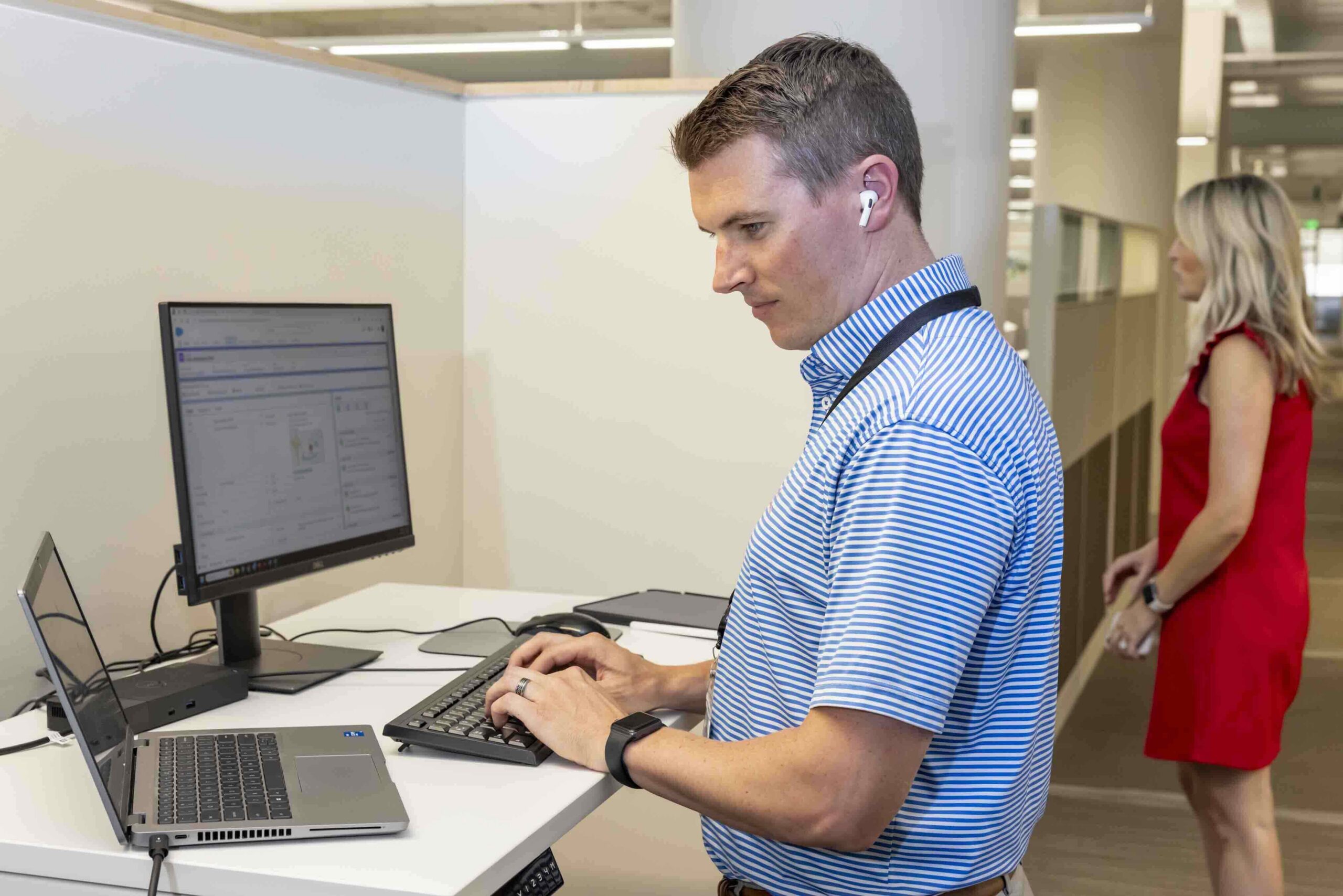 A Cottingham & Butler IT team member managing infrastructure from a workstation
